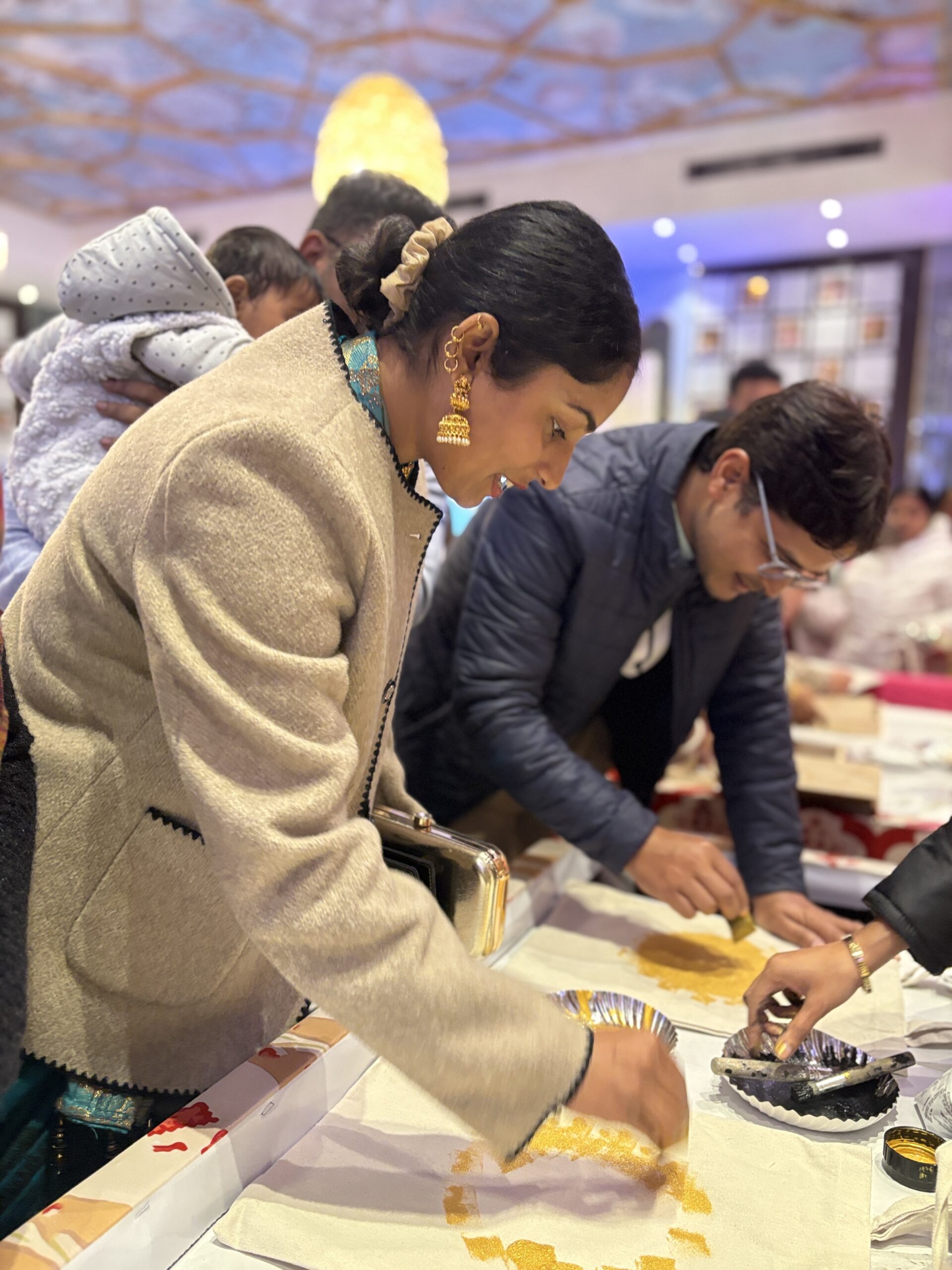 Kids engaged in a hands-on creative activity at a birthday party